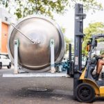 Stainless steel tank on the forklift