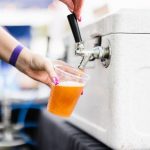 Pouring a beer at Beer Fest